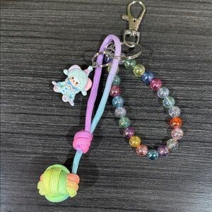 Colorful Beaded Keychain with clown Charm and monkeys fist